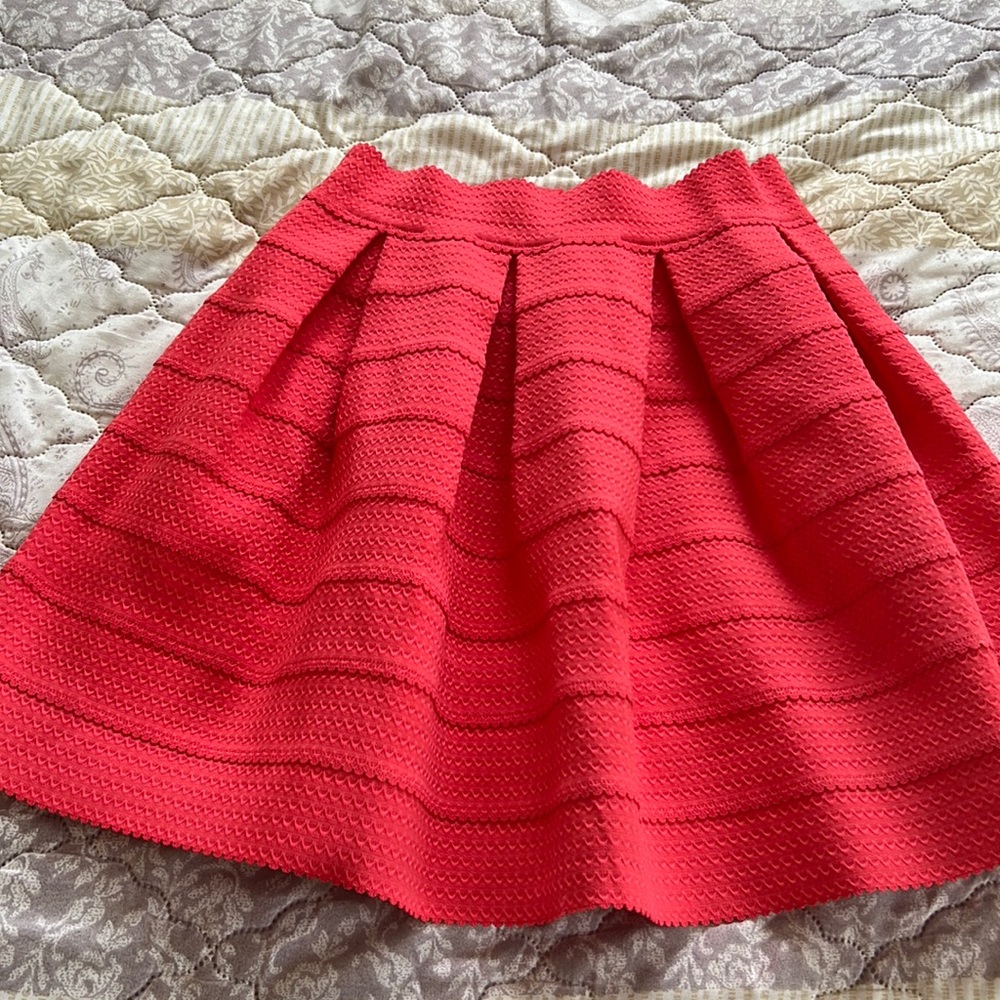 Orange pleated skirt